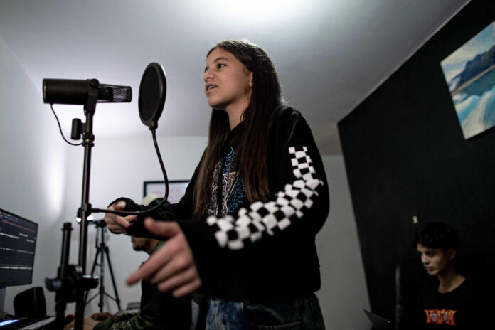 COLOMBIA-VENEZUELA-MIGRATION-MUSIC-HIP-HOP